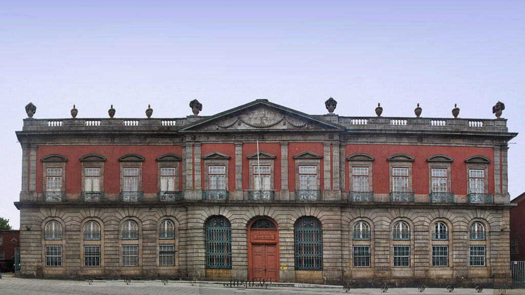 Elegant neoclassical façade of the Museu Soares dos Reis in Porto, showcasing detailed architectural elements and grand entry.